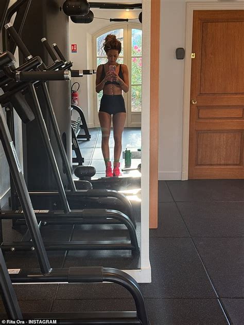 Rita Ora Flaunts Her Washboard Abs In A Nude Bikini Before Slipping