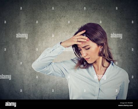 Closeup Portrait Of A Sad Young Beautiful Woman With Worried Stressed