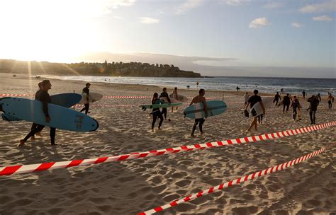 Australia opens Bondi Beach to surfers and swimmers