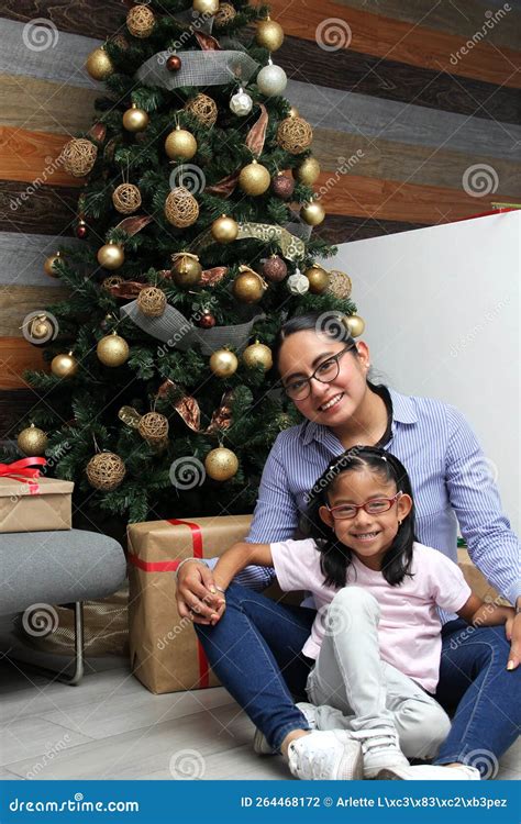 Divorced Single Mom And Daughter Latina Brunettes With Glasses Have Christmas Presents Sitting