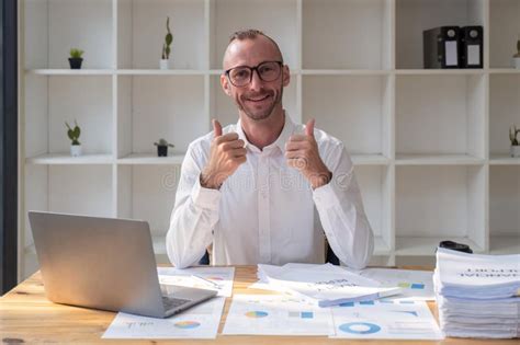 Business Man At The Office Success Sign Doing Positive Gesture With