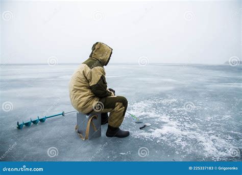 Winter Fishing on a Frozen Lake Stock Image - Image of fish, equipment: 225337183