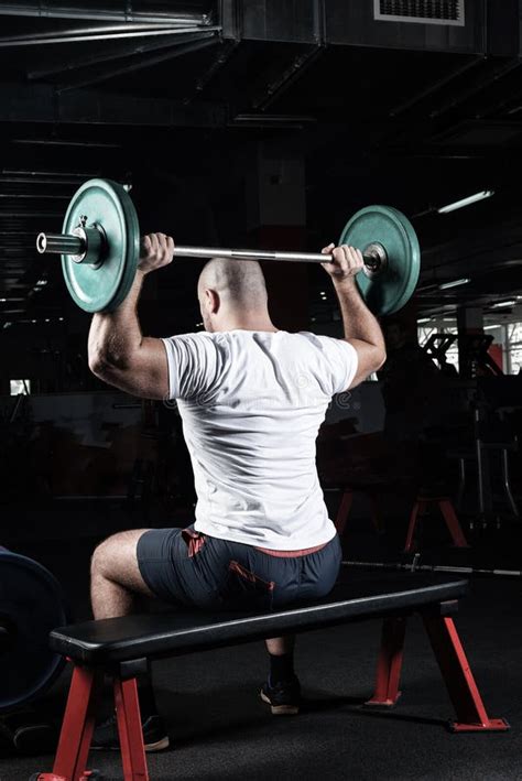 Male Athlete Lifts The Barbell Stock Photo Image Of Exercise Muscle