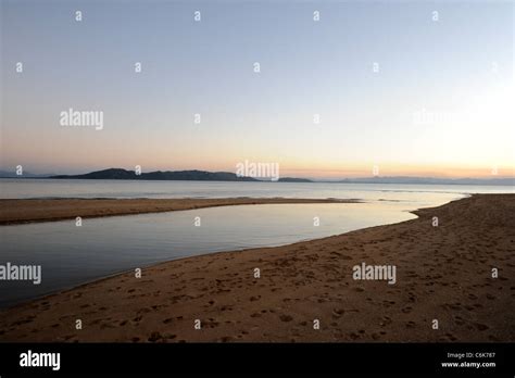 Incoming Tide And Evening Light On The Beach At West Point Magnetic