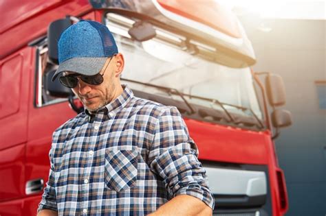 Premium Photo Professional Semi Truck Driver In Front Of His Vehicle