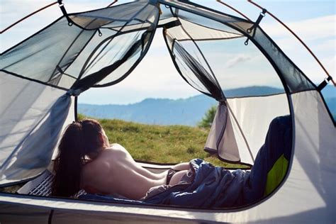 Premium Photo Back View Of Sporty Naked Woman Tourist Lying In Tent