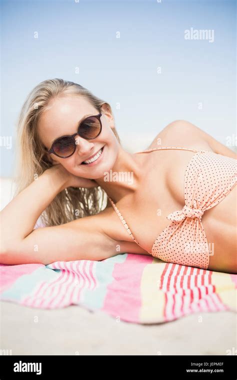 Pretty Woman In Bikini Lying On The Beach Stock Photo Alamy