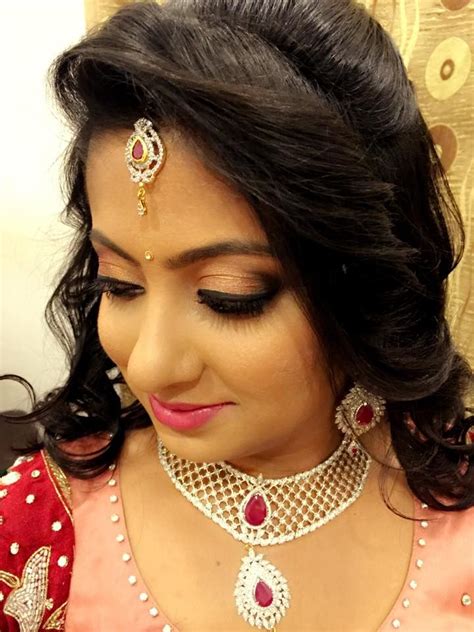 Indian Bride Wearing Bridal Hair Lehenga And Jewellery Reception Look