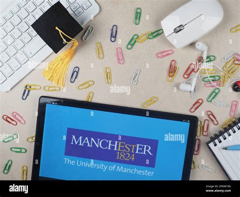 In this photo illustration, The University of Manchester logo seen ...