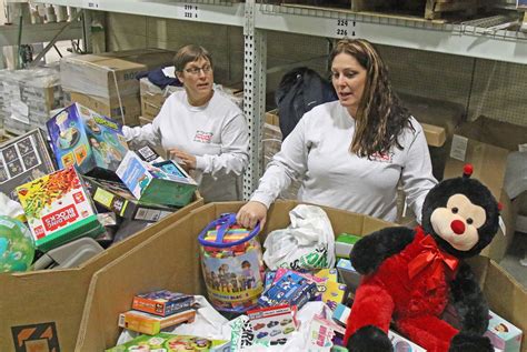 Toys for Tots volunteers sorting, organizing thousands of toys for ...