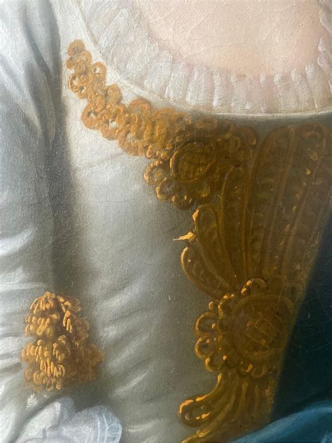 18th century portrait of a young lady in an ivory silk gown and blue
