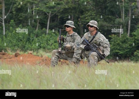 U.S. Army Soldier SSG Robert Gash (right) and U.S. Army Pvt. 1st Class ...