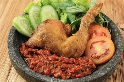 Premium Photo Ayam Penyet Or Penyetan Ayam Fried Chicken With Spicy