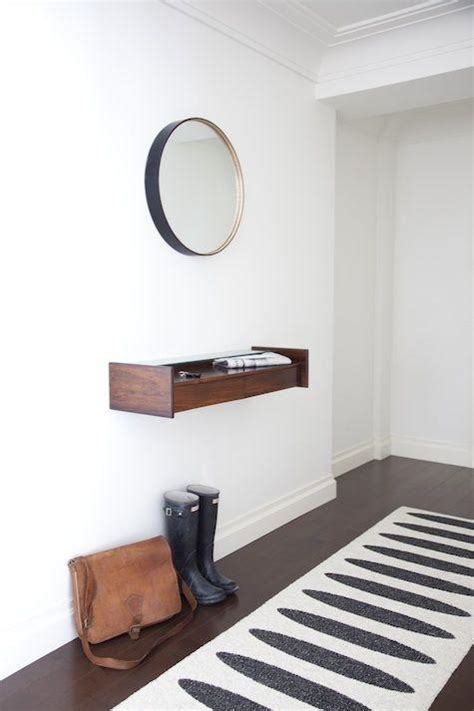 Hallway decorative shelf – and round mirror above it | | Founterior