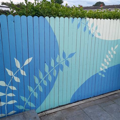 Creating an Outdoor Fence Mural | Garden fence art, Mural wall art ...