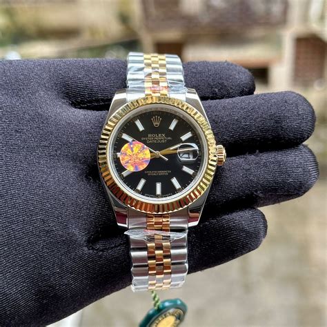 Rolex DateJust Silver-Gold Fluted Black YZ - Celebrity Watches