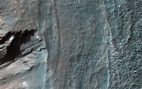 Crater Rim Layers Rubble And Gullies