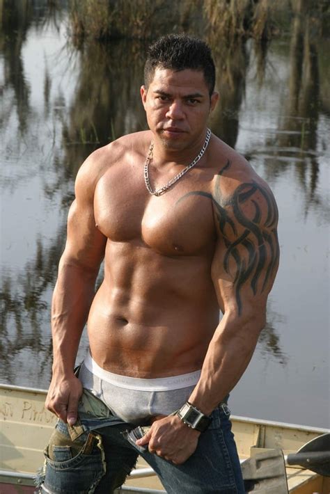Big Muscled Latino With Tattoos And Boner Takes His Clothes Off To Pose Naked By The Lake