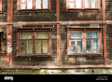 Windows on facade of traditional wooden buildings, Ural Mash ...