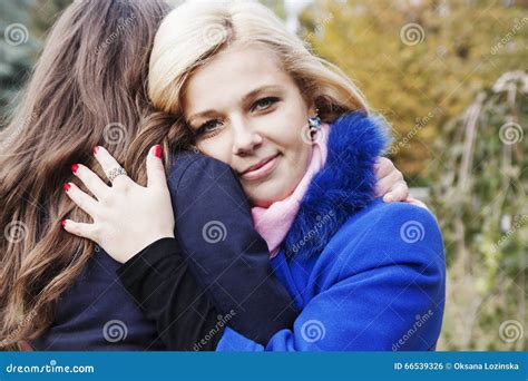 Woman Hugs Her Girlfriend Stock Photo Image Of Lifestyle 66539326