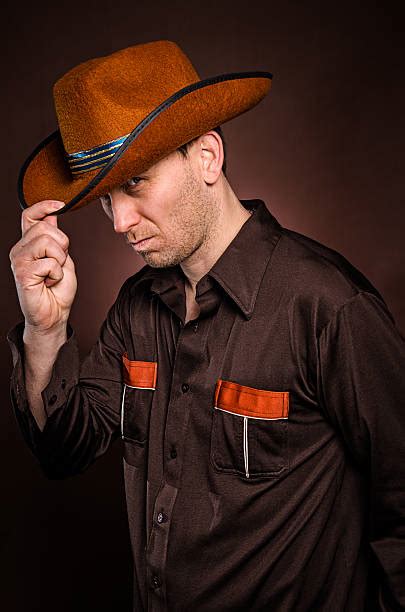 Cowboy Tipping His Hat Pictures Images And Stock Photos Istock