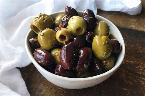 Garlic And Fresh Herb Roasted Olives Recipe Foodal