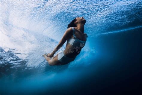 Surf Girl Dive Underwater With Wave Duck Dive Under Barrel Waves