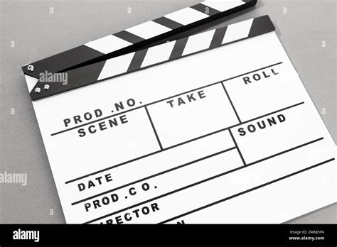 White Movie clapper board on gray background. Template Stock Photo - Alamy