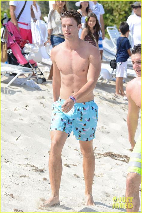 Patrick Schwarzenegger Shirtless Beach Football Photo