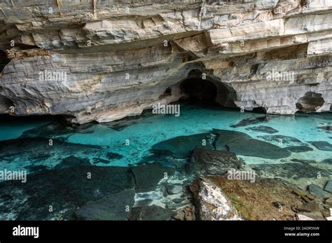 Beautiful View To Natural Blue Water River Inside Rocky Cave Chapada