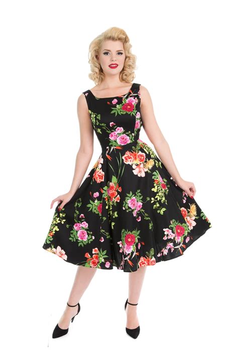 Robe pin up années 50 noire décorée de fleurs multicolores