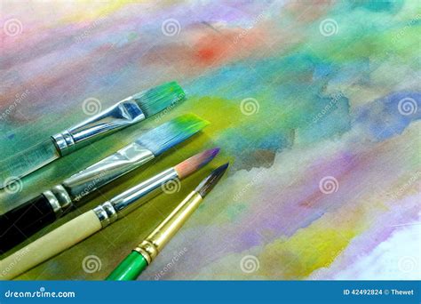 Watercolor paint brushes stock photo. Image of stain - 42492824