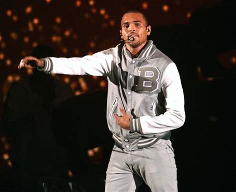 Chris Brown performed on a pyramid-like stage, jumping from block to ...