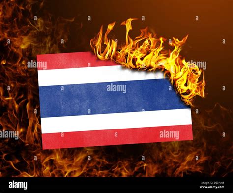 Flag burning - Thailand Stock Photo - Alamy