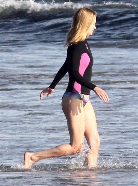 Rosie Huntington Whiteley Shows Off Her Ass In Bikini Bottom While