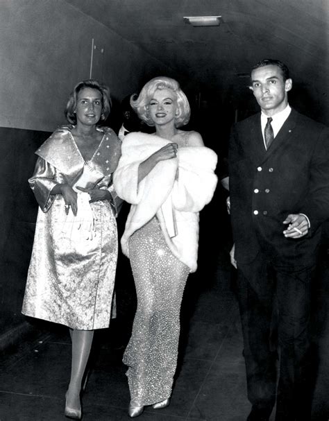 Marilyn Monroe, already a film and cultural icon, emerges as fashion