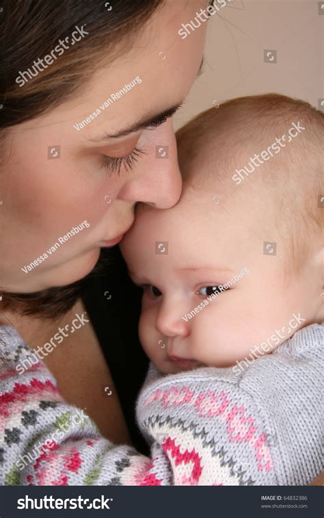 Beautiful Brunette Mother Holding Her Two Stock Photo Shutterstock