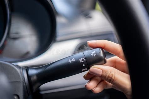 Woman Turning on Left Signal Switch, Close Up Shot of Her Hand. Car ...