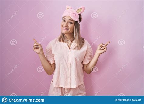 Blonde Caucasian Woman Wearing Sleep Mask And Pajama Smiling Confident