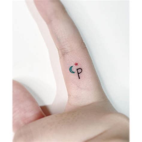 Tiny Letter P Star And Moon Tattoo Done On The