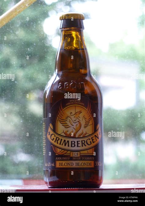 Grimbergen Blonde Is A Belgian Beer Known For Its Rich Malty Flavor And Golden Color It Is