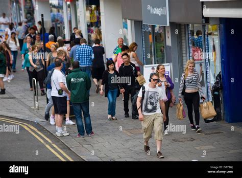 Shoppers And Torists On Busy High Street In Brighton East Sussex