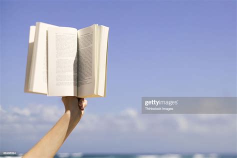 Hand Holding Book High Res Stock Photo Getty Images