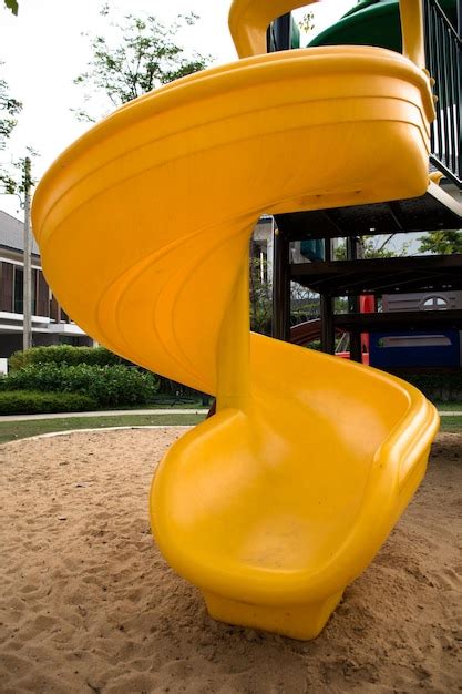 Premium Photo Close Up Of Yellow Slide In Playground