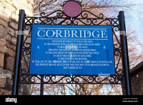 A sign outlining the history of Corbridge, a small, popular town on the banks of the River Tyne ...