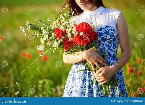 Girl with a Bouquet of Poppies. Woman with Long Hair in Dress Hold ...