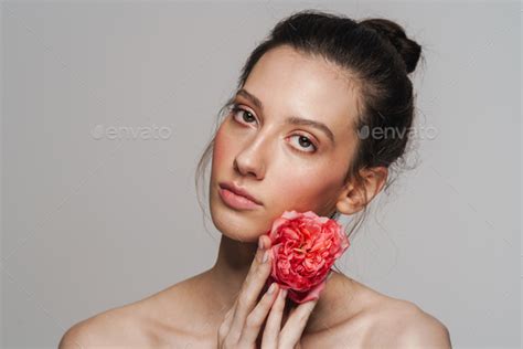 Beautiful Half Naked Woman Posing With Flower On Camera Stock Photo By