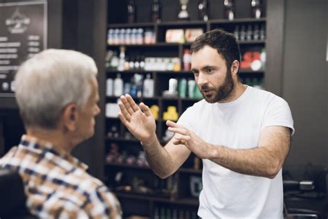 Premium Photo | Barber talk client in hairdressing studio.