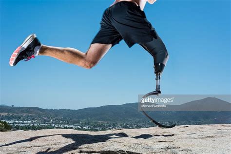 Low Angle Of Prosthetic Leg Running. | Prosthetic leg, Person running ...