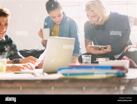 college students studying  coffee laptop  digital tablet stock